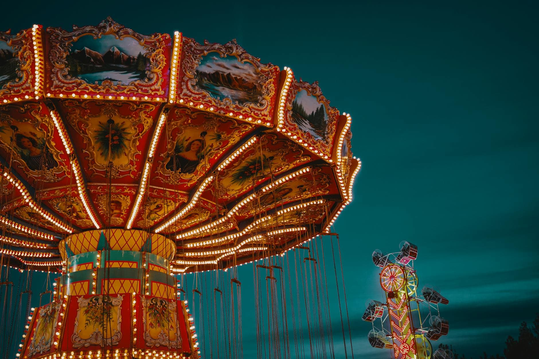 Brightly illuminated carousel at an amusement park during the evening, evoking a sense of fun and leisure. - child allergy mood swings