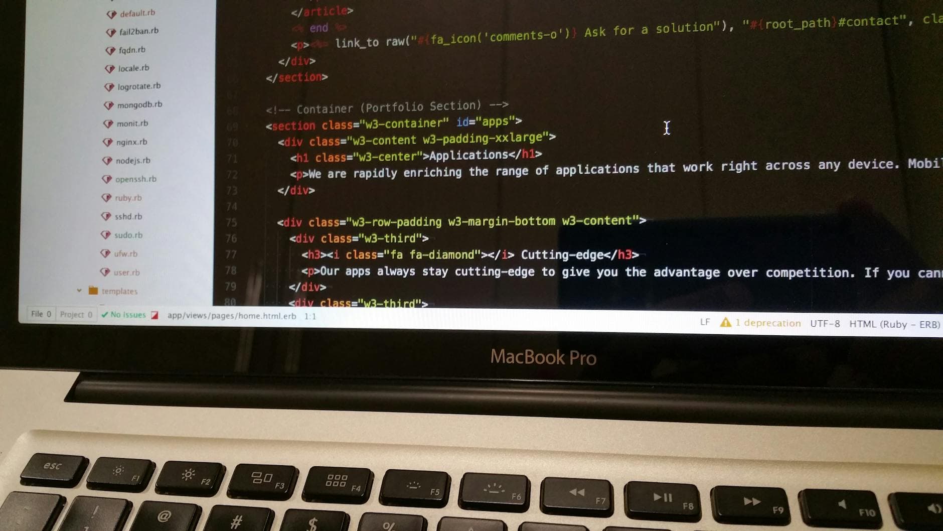 Close-up of HTML code displayed on a MacBook Pro screen, showcasing modern web development. - toddler language development