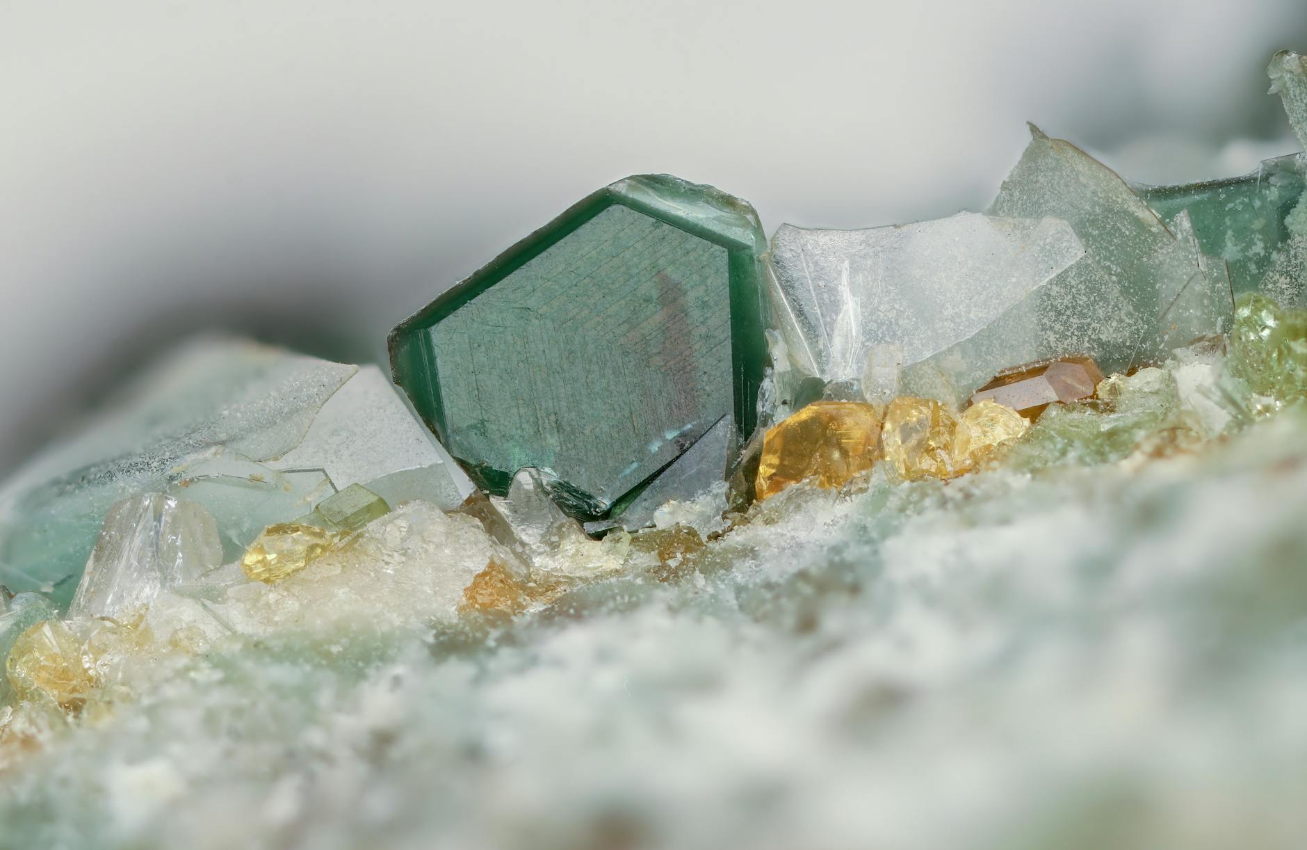 Detailed shot of translucent gemstone crystals with vibrant colors and intricate texture. - cbt for clarity