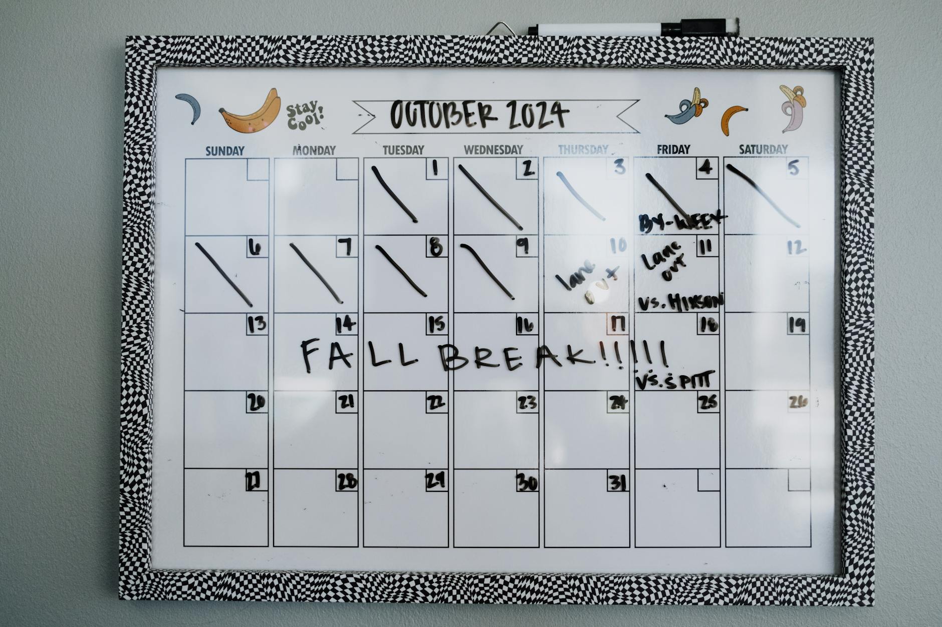 Close-up of a whiteboard calendar for October 2024 featuring a fall break note. - dating after long break