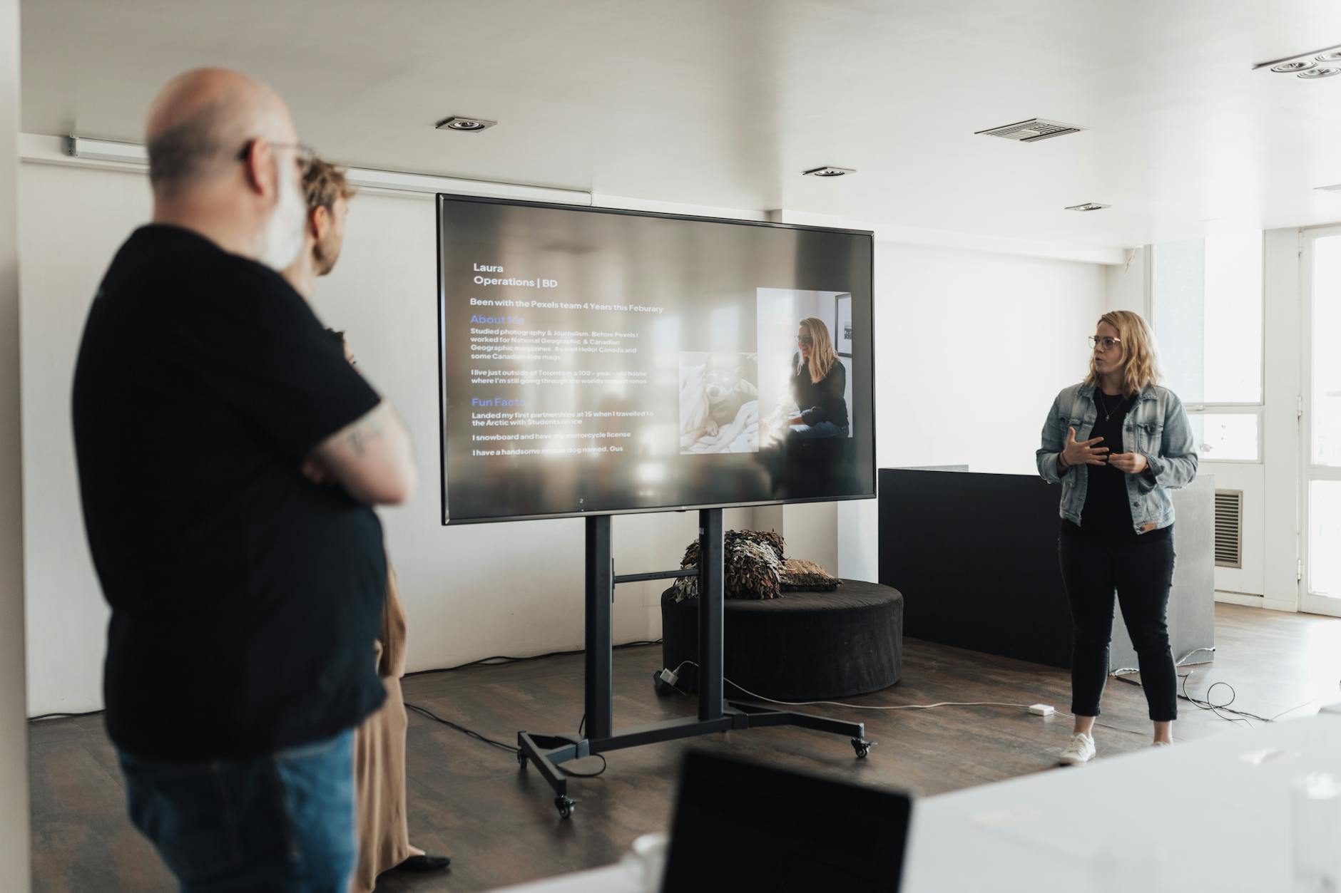 Business team engaged in a corporate presentation in a modern office space. - effective communication spring plans