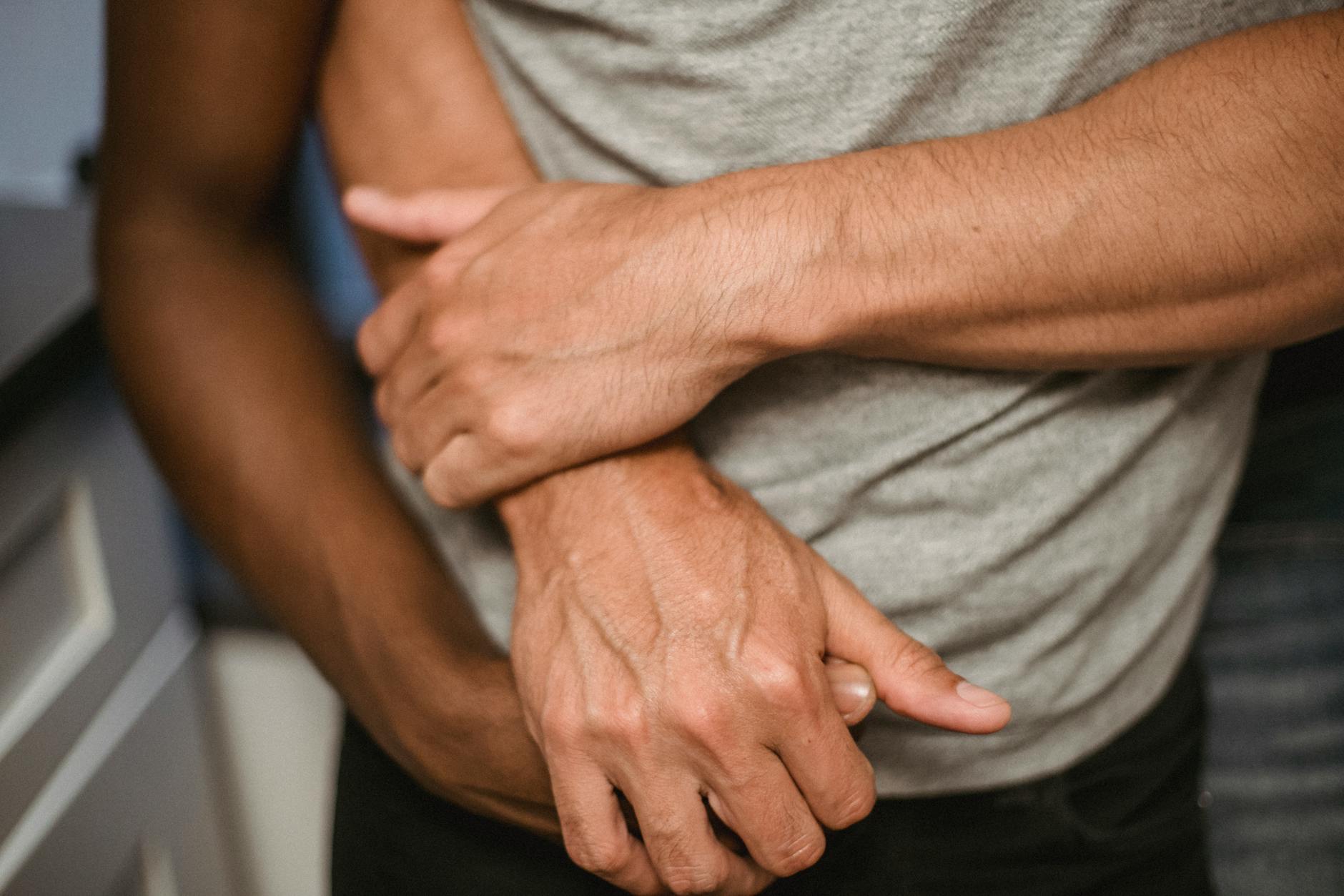 Close-up of two people holding hands, symbolizing love and connection. - future goals partner