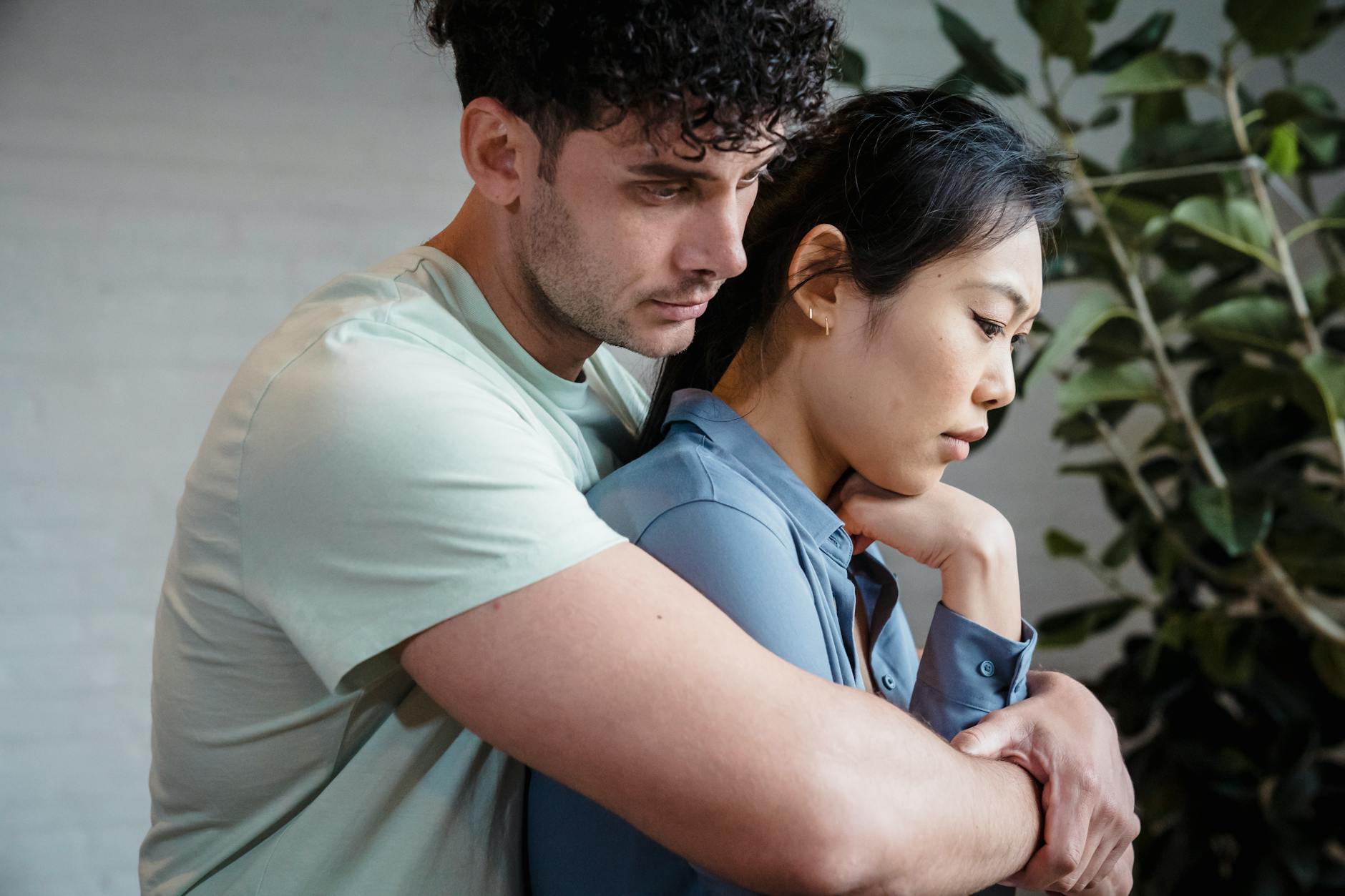 A close-up of a loving couple embracing, symbolizing intimacy and connection. - rebuilding trust couples