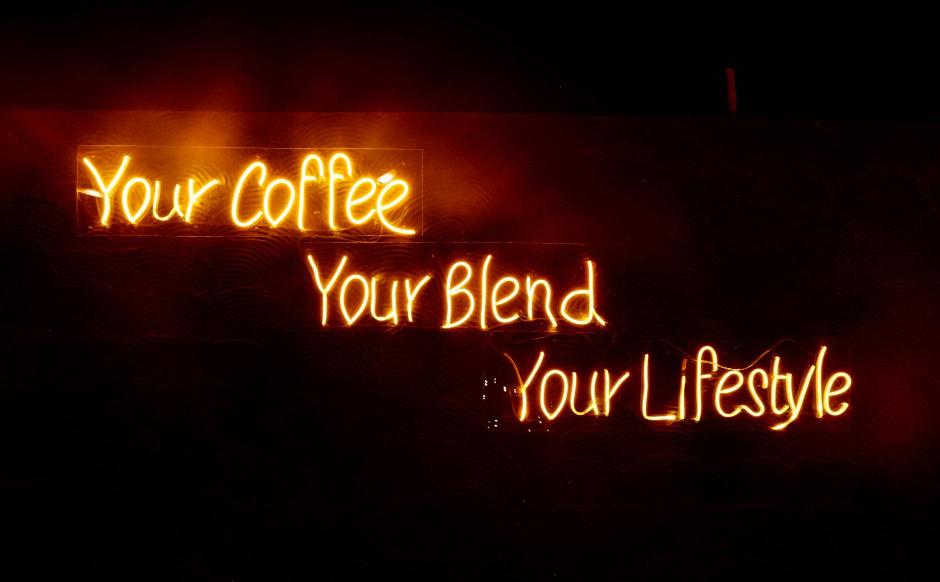 Glowing neon sign saying 'Your Coffee, Your Blend, Your Lifestyle' in warm tones, perfect for cafes. - refresh your relationship