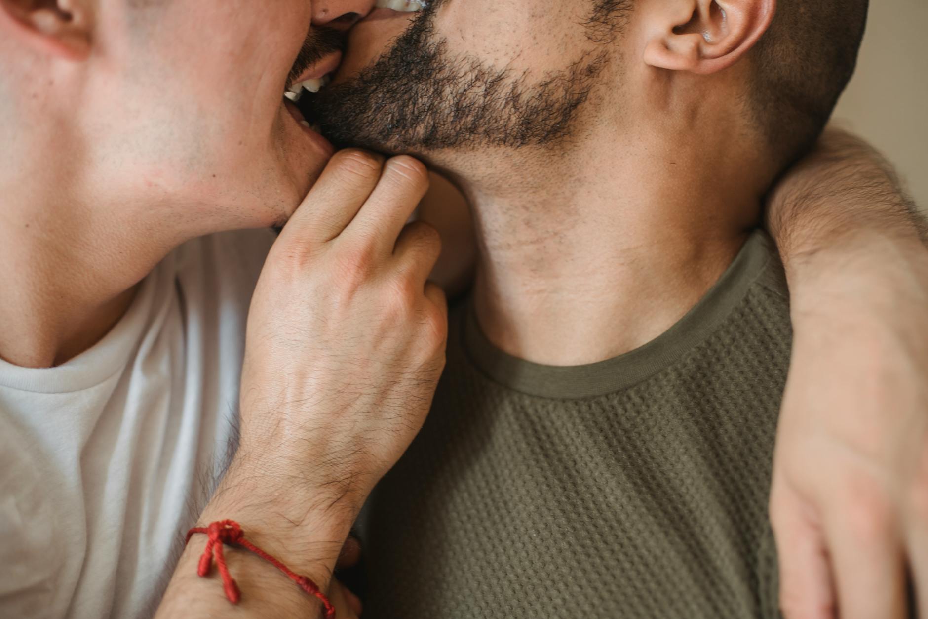 Intimate close-up of a couple embracing and kissing, showcasing love and affection. - rekindle intimacy couples