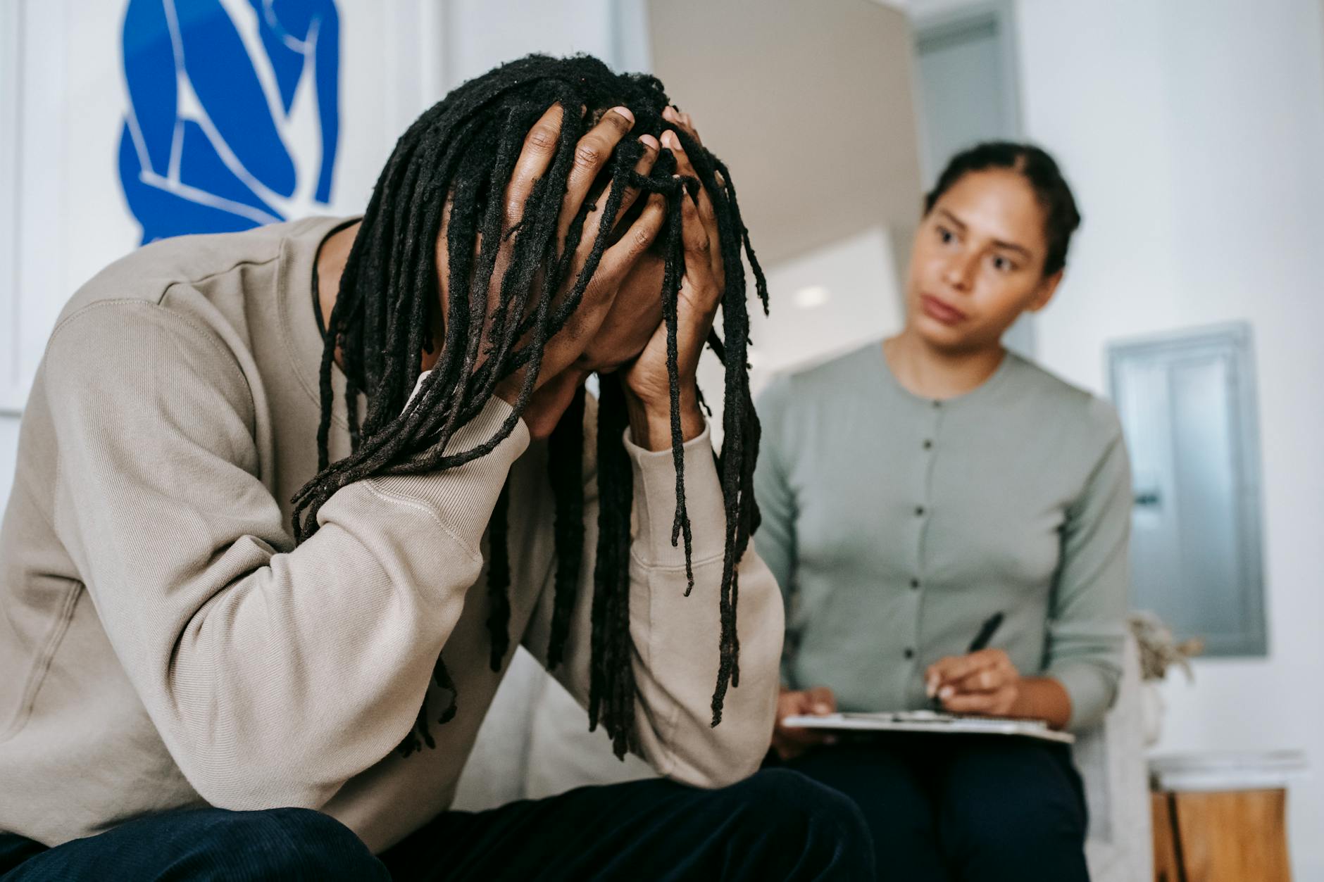 A young couple in a serious indoor discussion, dealing with relationship issues and emotions. - relationship anxiety spring