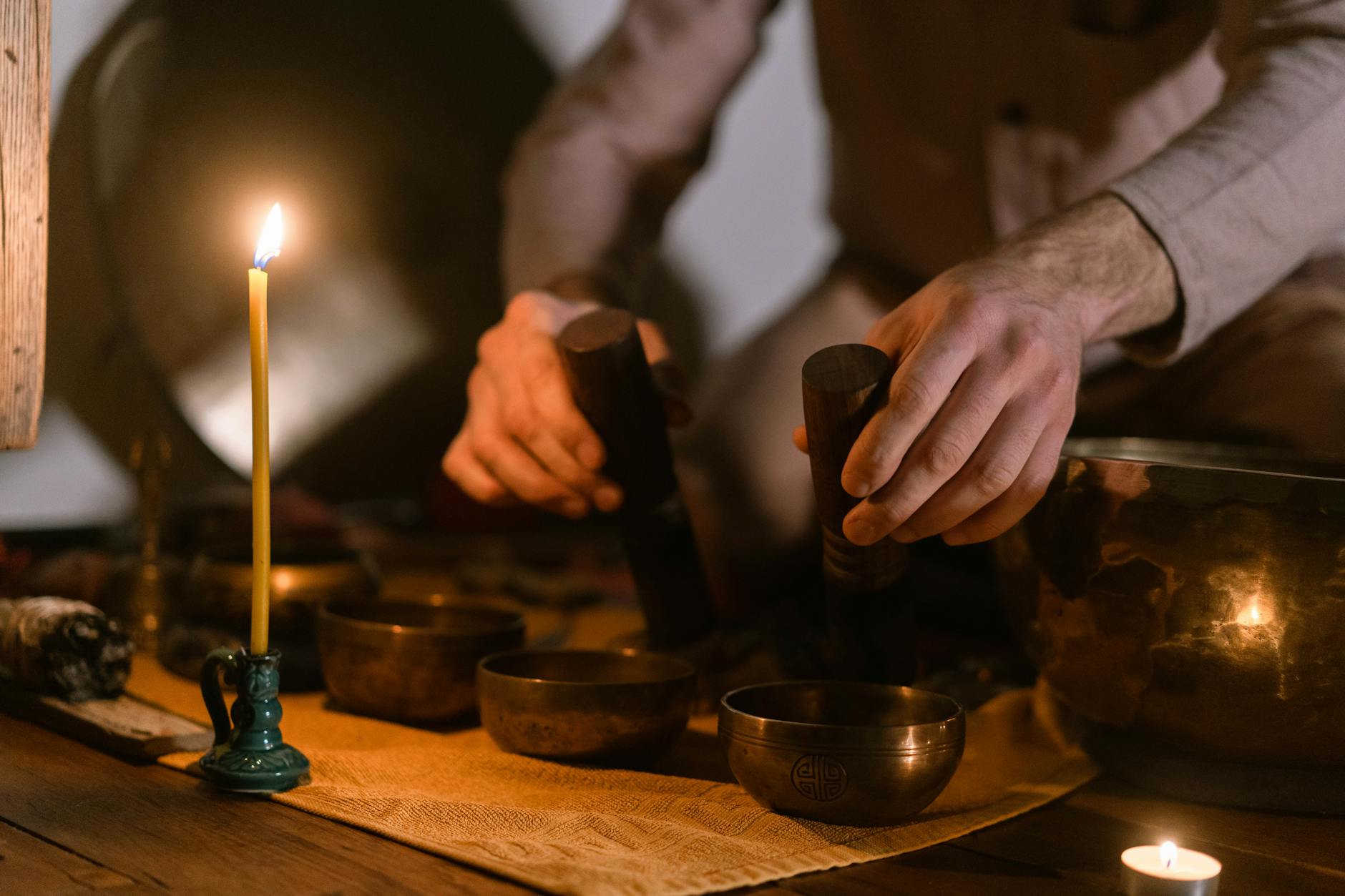 A serene meditation setting with singing bowls and candlelight, emphasizing mindfulness and tranquility. - therapy intentions